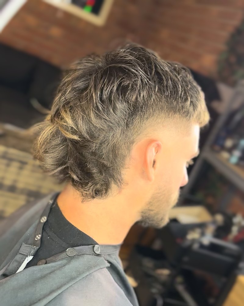 Mullet with a faded side and blonde tips